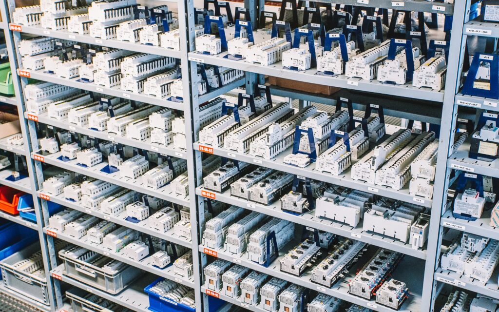 relays and industrial automation components on a shelf