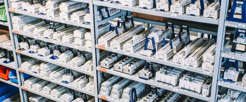 relays and industrial automation components on a shelf